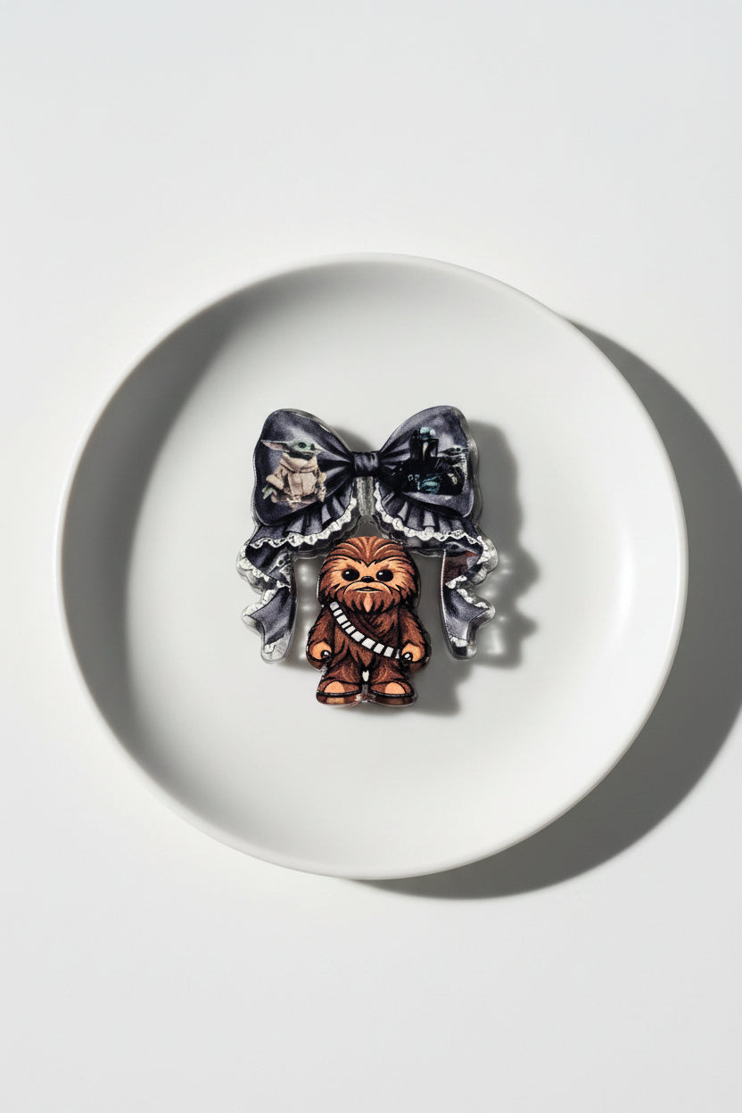 Acrylic beads set of 2 including a bow and a bead