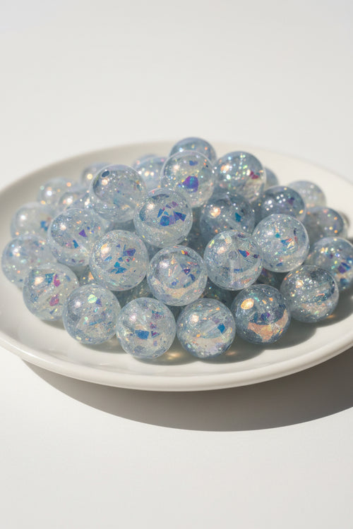 16mm bow resin beads close-up showing encased bow detail | Beadtacular
