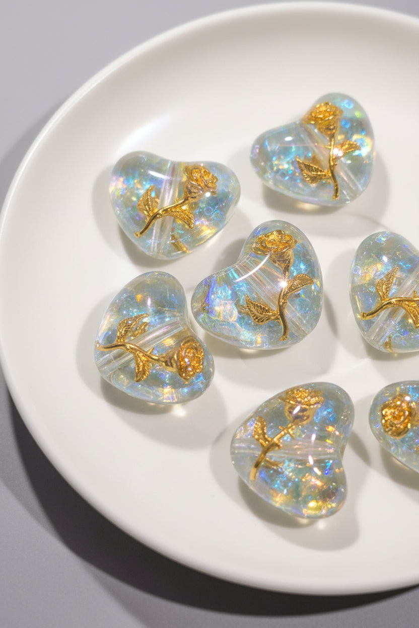 Resin heart beads close-up showing encased gold flower detail | Beadtacular
