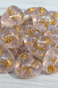 Resin heart beads with a gold flower inside