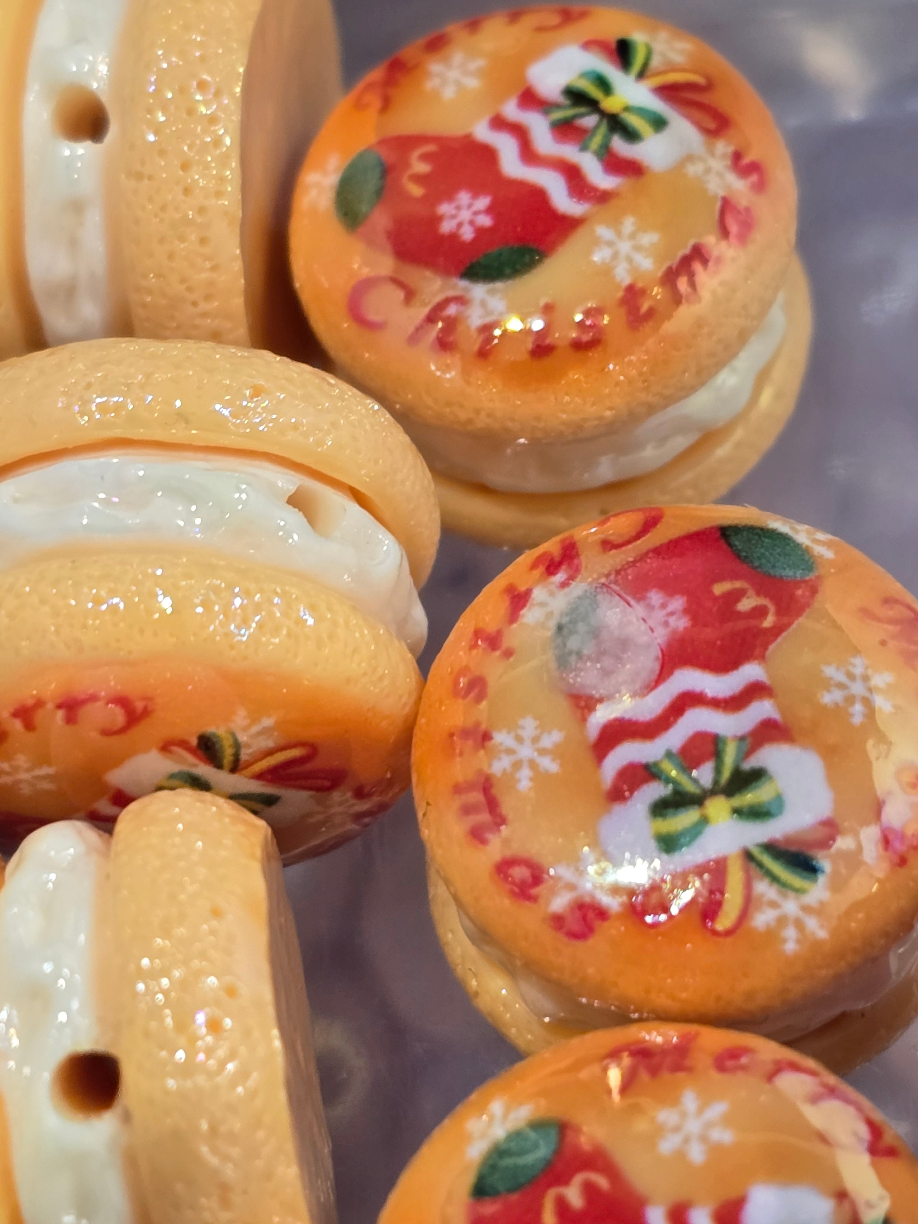 "Orange glitter resin Christmas cookie bead with Christmas stocking and Merry Christmas text design"