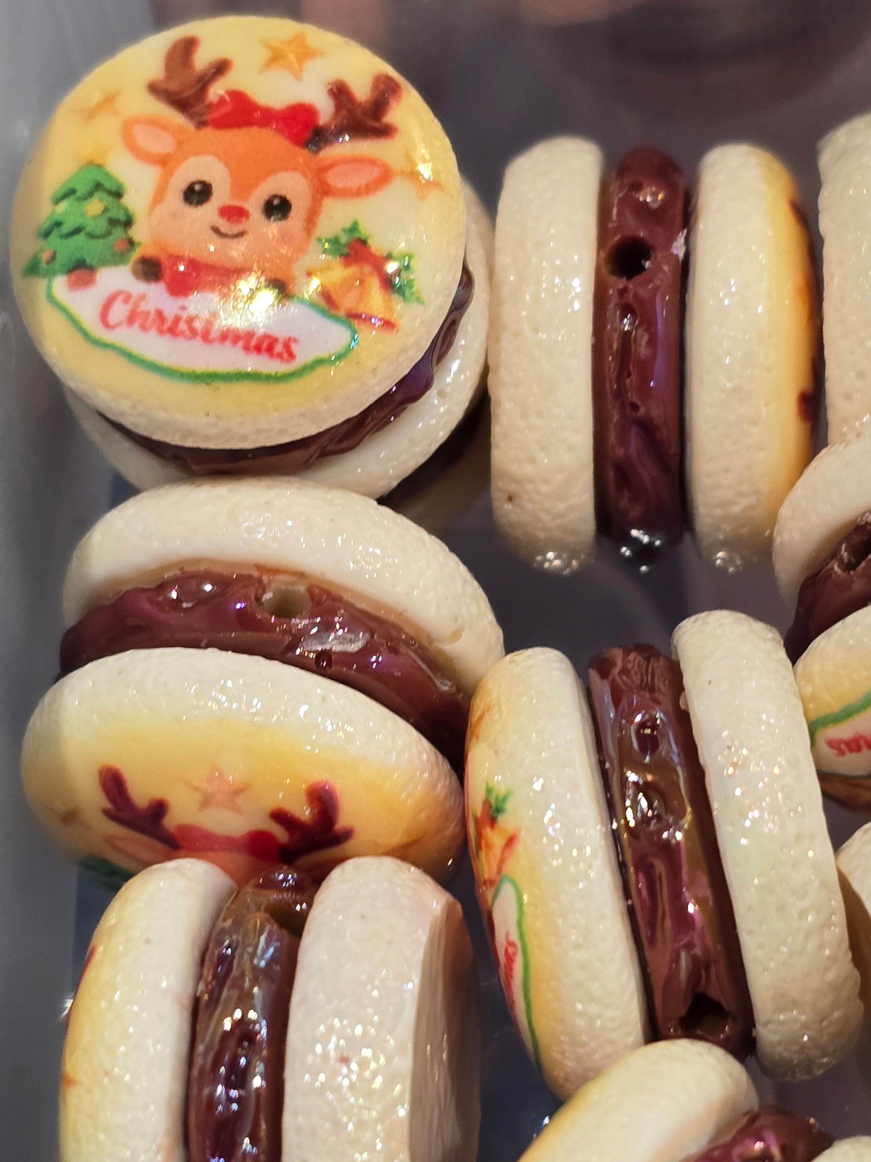 "White resin Christmas cookie bead with cute reindeer and Christmas text design"