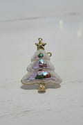 A Christmas tree-shaped clear resin pendant with gold trim, featuring Santa Claus, a reindeer, snow, and a gold star topper.