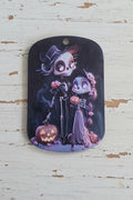 A rectangular acrylic tag with rounded corners featuring a colorful Day of the Dead (Calavera) and Sally the skeleton illustration.