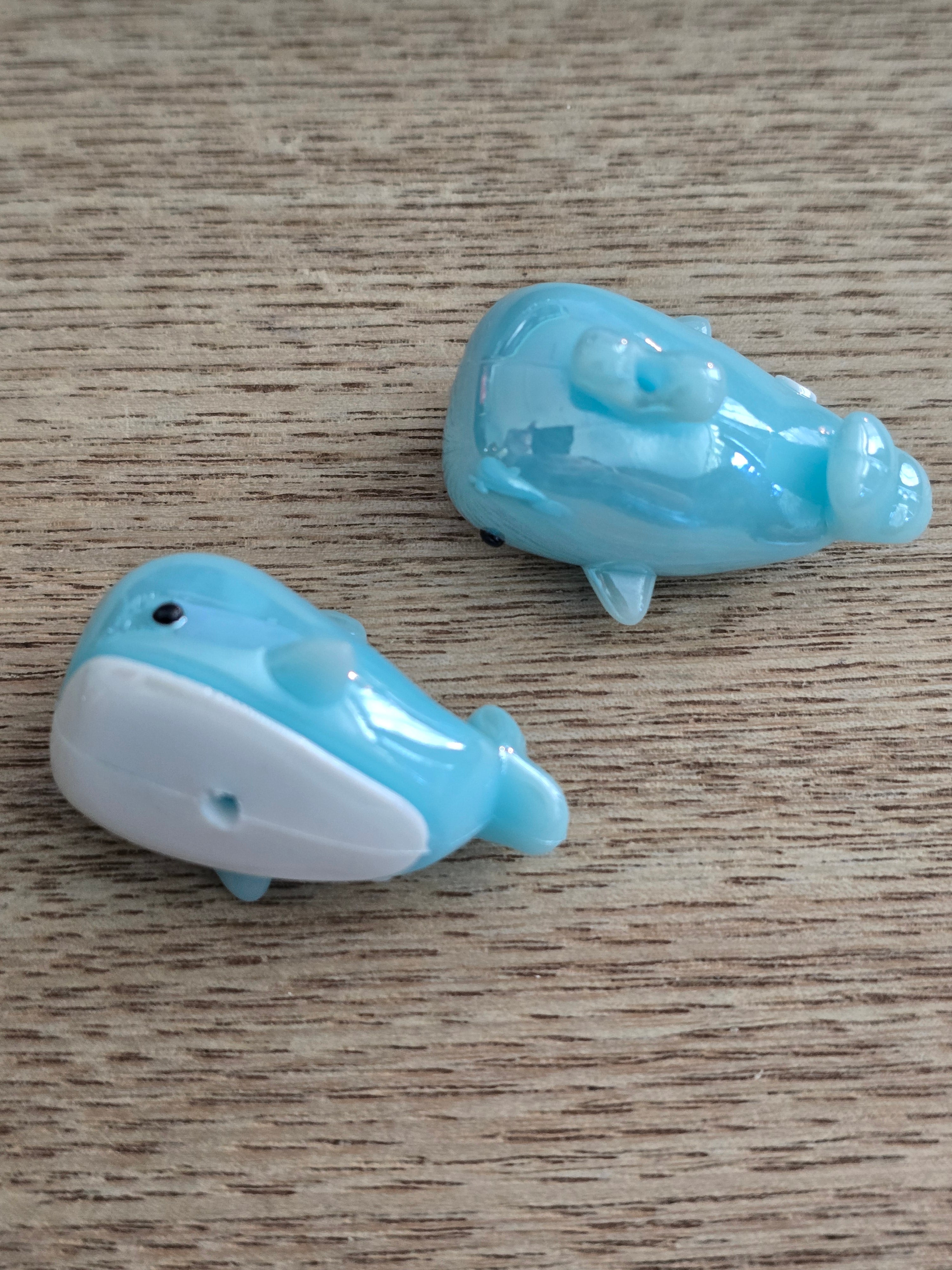whale-shaped bead in light blue and white.