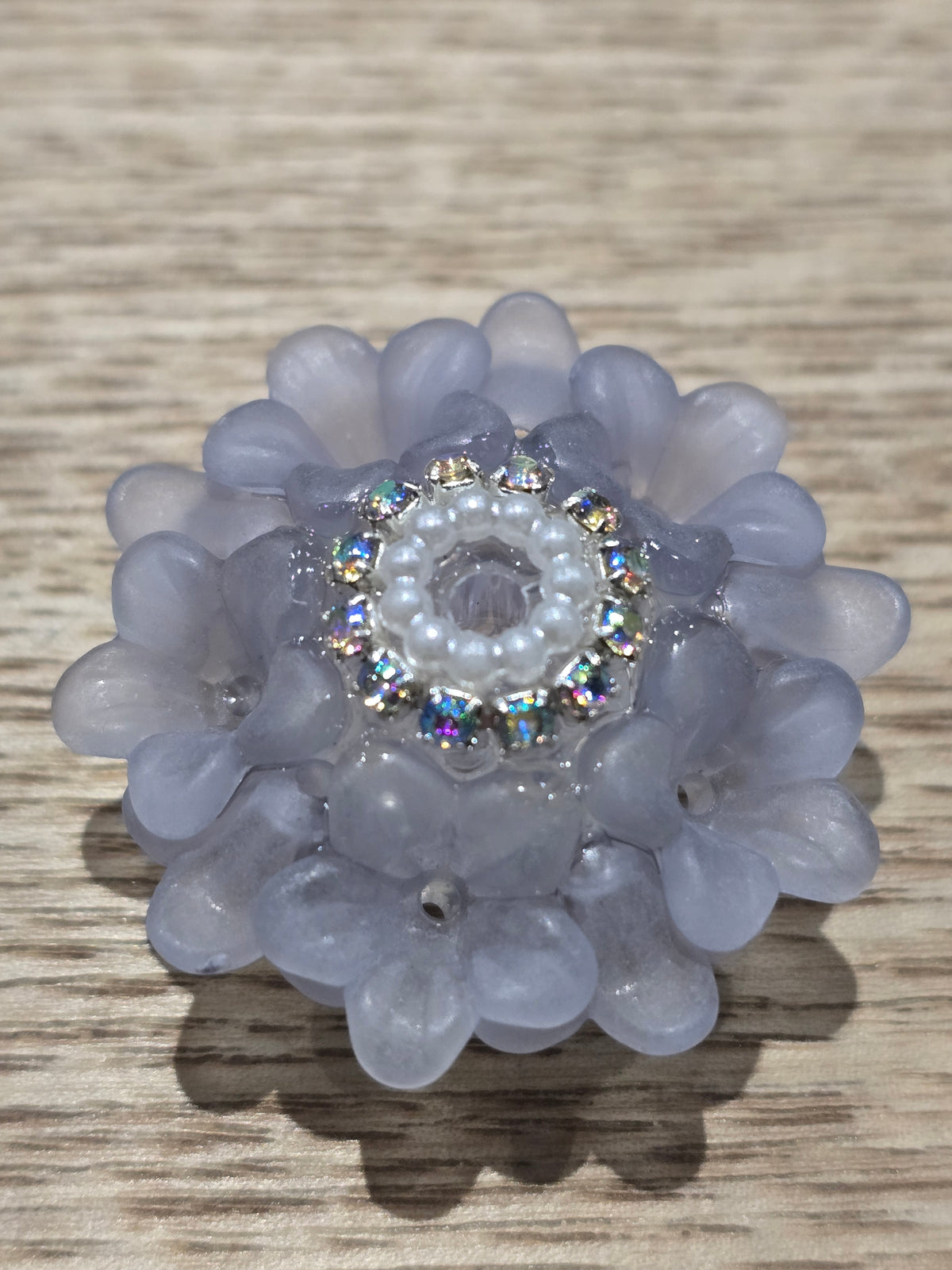 pale blue flower fancy bead with rhinestone edging