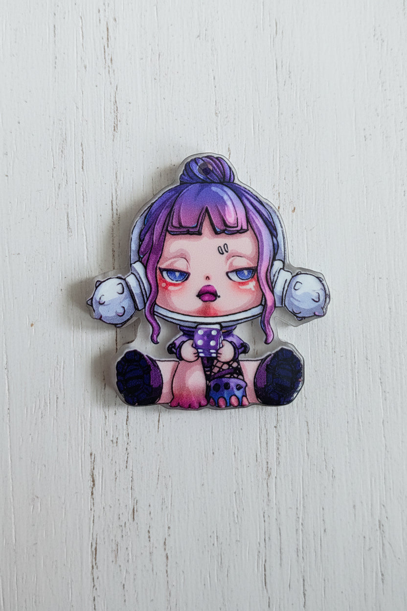A small illustrated acrylic bead featuring a girl character with purple hair, blue eyes.