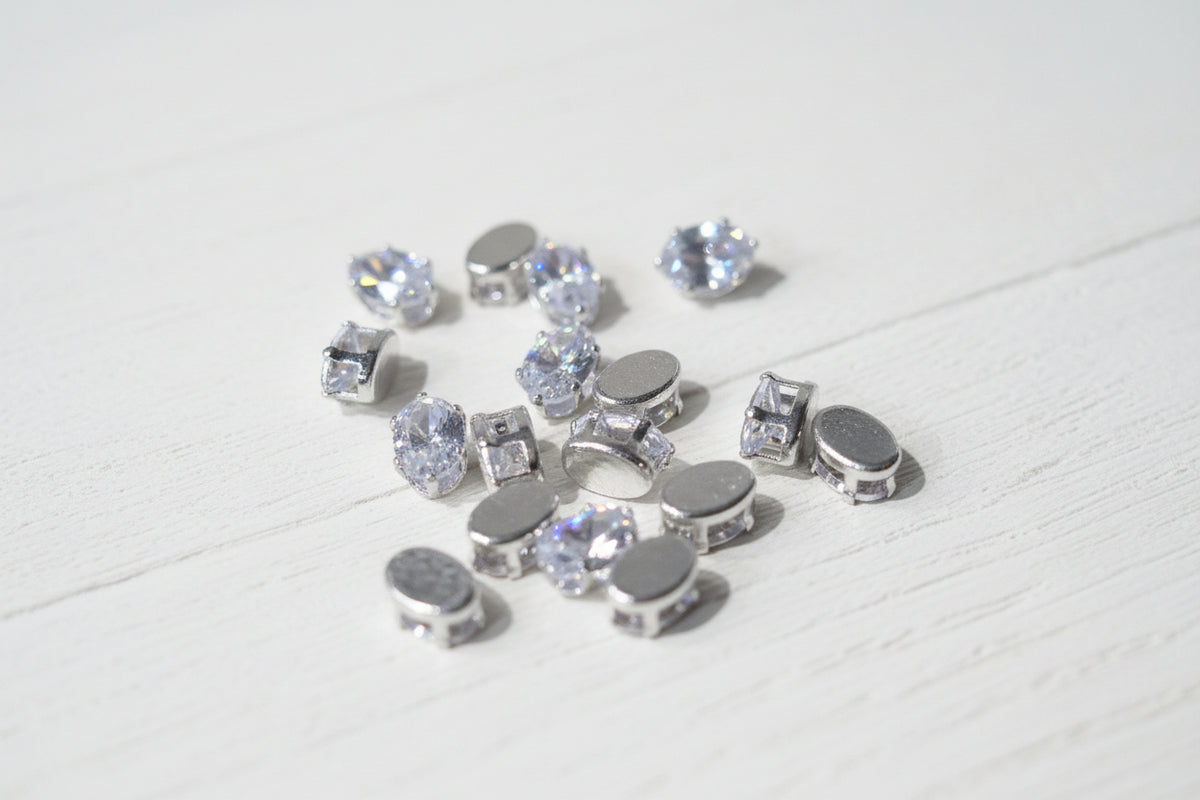 oval-shaped zircon beads.