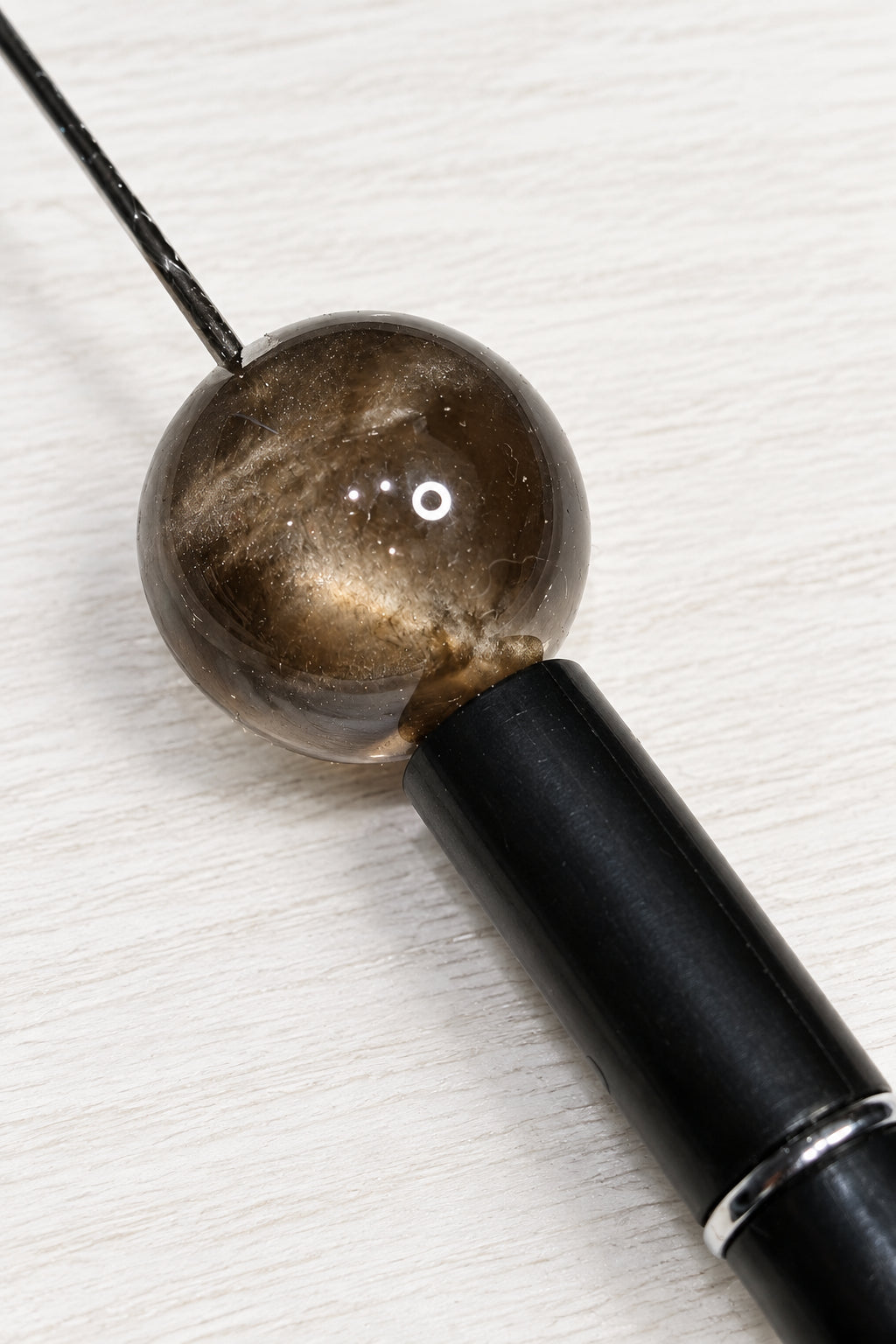 25mm resin bead in a brown colour